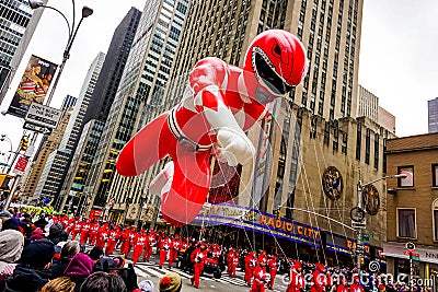 Power Ranger balloon floats in the air during the annual Macy`s Thanksgiving Day parade along Avenue of Americas Editorial Stock Photo