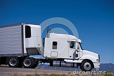 Power Semi Truck Rig And Reefer Trailer Side View Stock Power Semi Truck Rig And Reefer Trailer Side View Stock