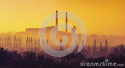 Power station with smoking chimney Stock Photo