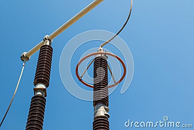 Power substation detail, red high voltage isolation over blue sk Stock Photo
