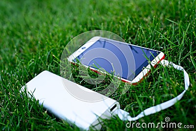 Powerbank charging smartphone Stock Photo