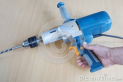 Powerful drill with reduced rpm for large-diameter holes and for mixer, professional tool Stock Photo