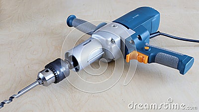 Powerful drill with reduced rpm for large-diameter holes and for mixer, professional tool Stock Photo