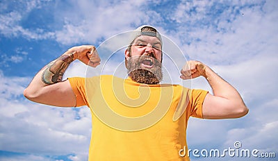 Powerful and free. Man bearded muscular brutal hipster outdoors sky background. Masculinity and brutality. Lumbersexual Stock Photo