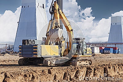Powerful hydraulic drilling rig and excavator at a mine construction site. The device of pile foundations. Bored piles. Heavy Editorial Stock Photo