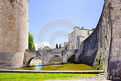 Powerful medieval walls and a moat Stock Photo