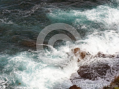 Powerful Pacific Ocean Waves Crashing on Rocks Stock Photo