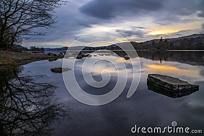 Powerful Reflection On The Shores Of Coniston Water Stock Photo