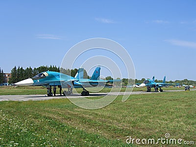 Powerful Russian military jet fighter plane on the runway of the SU-34 Editorial Stock Photo