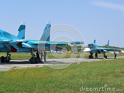 Powerful Russian military jet fighter plane on the runway of the SU-34 Editorial Stock Photo