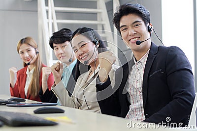 Powerful and Sucessful of Business group Call Center and technical Support staff for receptionist phone operator. Asian customer Stock Photo