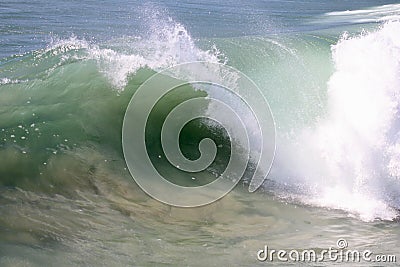 Powerful wave crashing in the ocean Stock Photo