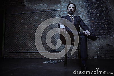 Powerful world class criminal sitting on his throne Stock Photo