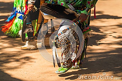 Powwow. Native Americans dressed in full regalia. Details of regalia close up. Stock Photo