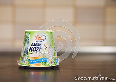 POZNAN, POLAND - Oct 06, 2017: Pilos goat cheese on table Editorial Stock Photo