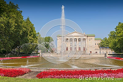 Poznan Stanislaw Moniuszko Great Theatre Opera building with fountain and garden, Poland. Editorial Stock Photo
