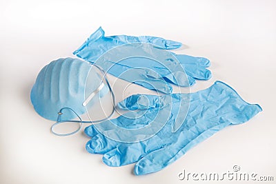 PPE blue gloves and a mask on white background Stock Photo