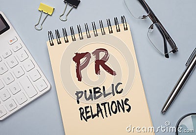 PR acronym word on paper. Public Relations concept Stock Photo