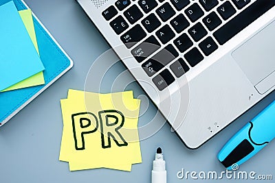 PR public relations concept. Workplace with laptop Stock Photo