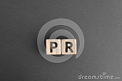 PR - wooden blocks with letters Stock Photo