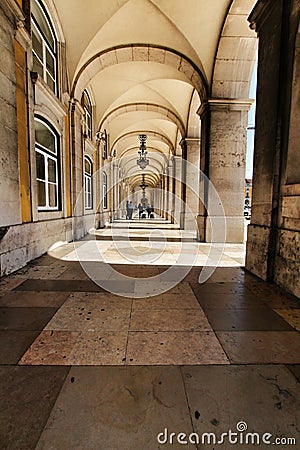 Praca do Comercio arcades in a sunny day in Lisbon Editorial Stock Photo