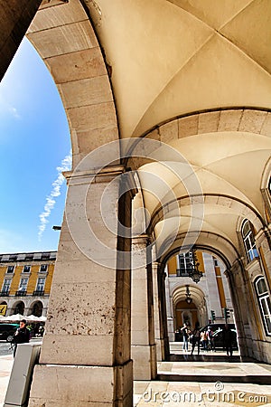 Praca do Comercio arcades in a sunny day in Lisbon Editorial Stock Photo