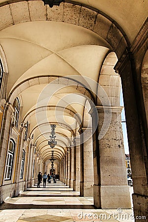 Praca do Comercio arcades in a sunny day in Lisbon Editorial Stock Photo