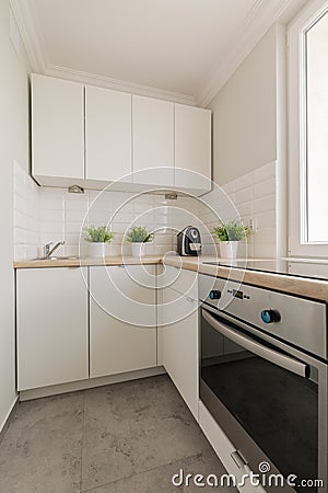 Practical cupboards and oven Stock Photo