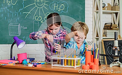 Practical knowledge. Child care and development. School classes. Kids adorable friends having fun in school. School Stock Photo