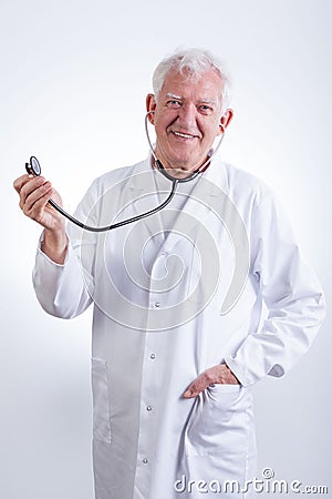 Practiced doctor with stethoscope Stock Photo