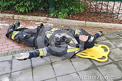 Practicing dummy for firefighters on a strecher Stock Photo