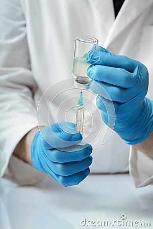 Doctor preparing medication for the vaccination campaign Stock Photo