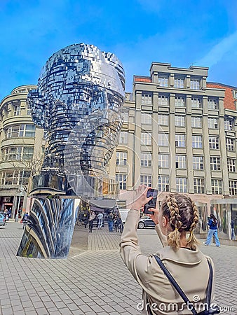 Prague- Czech- 4 april 2024: Statue of Franz Kafka, the work by David Cerny Editorial Stock Photo