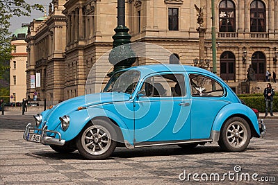 PRAGUE, CZECH REPUBLIC - APRIL 21, 2017: Vintage blue Volkswagen Beetle car, parked in front of the Rudolfinum concert hall Editorial Stock Photo