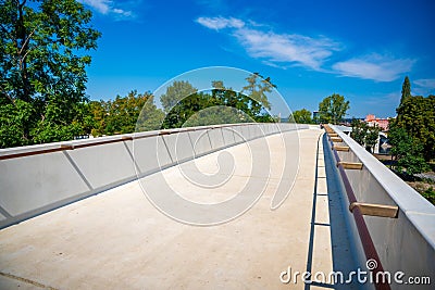 Prague, Czech Republic - August 19, 2023: Holka footbridge in Prague. New and modern bridge over Vltava river from Editorial Stock Photo