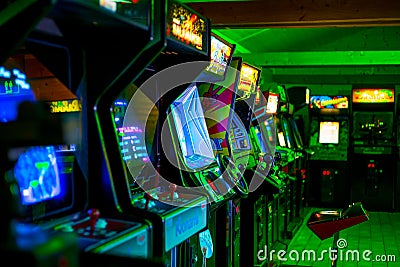 PRAGUE - CZECH REPUBLIC, August 5, 2017 - Room full of of 90s Era Classic Arcade Video Games Editorial Stock Photo