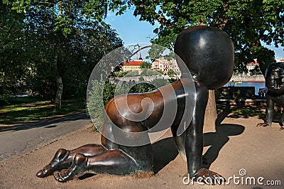 PRAGUE, CZECH REPUBLIC - July 16, 2017: Head closeup of crawling baby sculpture by David Cerny in the yard of Kampa Art Editorial Stock Photo