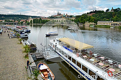 PRAGUE, CZECH REPUBLIC - JULY 20, 2017: Pleasure boat close-up with advertising inscription Boats of PragueView the Cathedral. Editorial Stock Photo