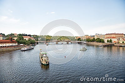 Prague, Czech Republic - June 03, 2017: Pleasure boats on Vltava river. travel by water transport. Holiday cruiser ships on citysc Editorial Stock Photo