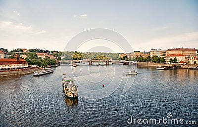 Prague, Czech Republic - June 03, 2017: Pleasure boats on Vltava river. travel by water transport. Holiday cruiser ships Editorial Stock Photo