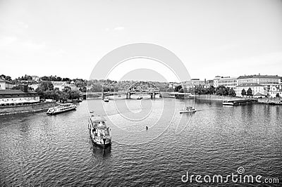 Prague, Czech Republic - June 03, 2017: Pleasure boats on Vltava river. travel by water transport. Holiday cruiser ships Editorial Stock Photo