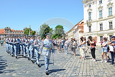 Prague, Czech Republic - June 27th 2019: Tourists watching traditional changing of honor guards in front of the Prague Castle. Editorial Stock Photo