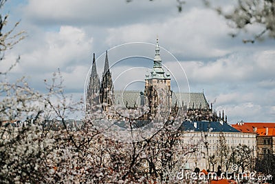 Prague, Czech Republic, 26 March 2023: Panorama of old town from Petrin Hill, Red roofs, Cloudy spring day, High spires medieval Editorial Stock Photo