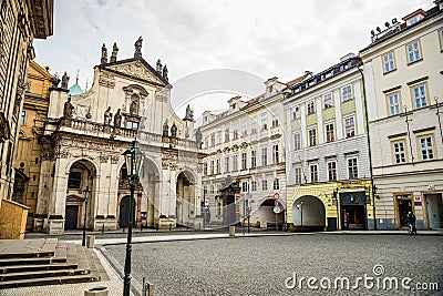 Prague, Czech republic - March 19, 2020. Square Krizovnicke namesti in front of entrance to Charles Bridge without tourists during Editorial Stock Photo