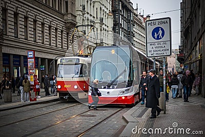 PRAGUE, CZECH REPUBLIC - MARCH 5, 2016: The vintage excursion tram number 14 and modern tram number 9 parade are goes on old town Editorial Stock Photo