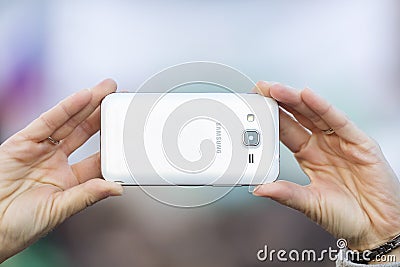 Somebody taking a photo with a phone of the demonstration on Prague Wenceslas square against the current government and Babis Editorial Stock Photo