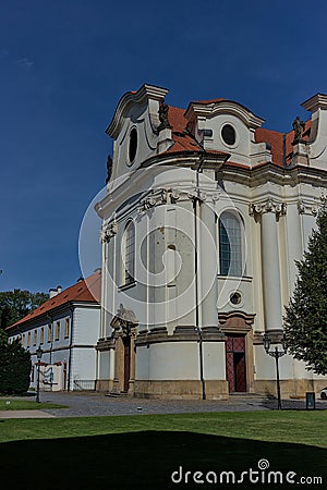 Baroque white benedictine monastery Brevnov with church. Editorial Stock Photo