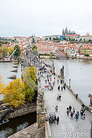 Prague, Czech Republic - October 09.2019: bell tower on the ancient Prague Charles Bridge crosses Vltava river Editorial Stock Photo