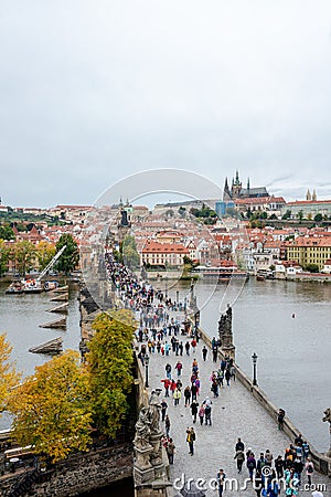 Prague, Czech Republic - October 09.2019: bell tower on the ancient Prague Charles Bridge crosses Vltava river Editorial Stock Photo