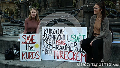 PRAGUE, CZECH REPUBLIC, OCTOBER 17, 2019: Demonstration people against Turkey banners flag sign save the Kurds, Petra Editorial Stock Photo